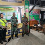 Besinergi Polsek Simpang Dua Bersama TNI Laksanakan Pengamanan Pos Pam Ketupat 2025